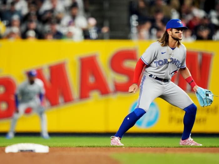 Blue Jays shortstop Bo Bichette lines up on the other side of second base as part of an infield shift.