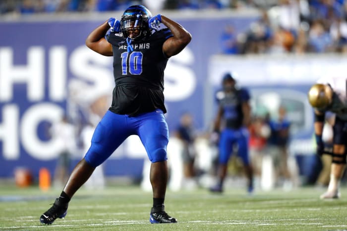 Memphis Tigers defensive lineman Morris Joseph celebrates a sack against Navy during their game at the Liberty Bowl Memorial Stadium on Thursday, September 26, 2019. W 28786