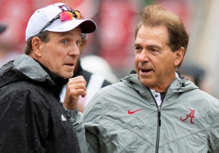 Texas A&M head coach Jimbo Fisher andAlabama head coach Nick Saban chat at midfield before the Alabama vs. Texas A&M game in Tuscaloosa, Ala., on Saturday September 22, 2018.