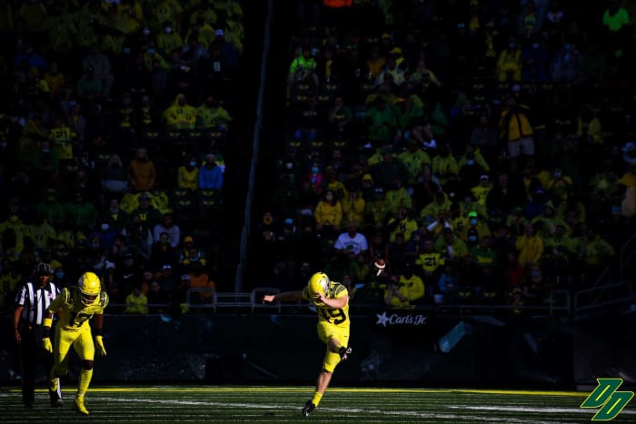 Camden Lewis kicks off for the Oregon Ducks against the Stony Brook Seawolves during a game at Autzen Stadium.