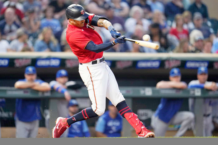 Former Twins Carlos Correa hits an RBI double during the third inning of a baseball game against the Royals on Tuesday, Sept.  13, 2022, in Minneapolis.