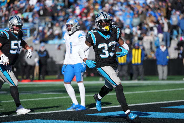 Panthers running back D'Onta Foreman scores a touchdown against the Lions in Week 16.