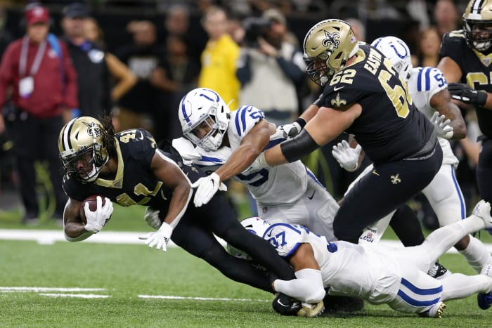 Dec 16, 2019; New Orleans, LA, USA; New Orleans Saints running back Alvin Kamara (41) is tackled by Indianapolis Colts safety Khari Willis (37) in the second quarter at the Mercedes-Benz Superdome.