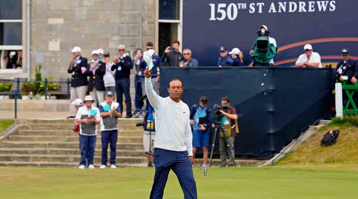 Tiger Woods waves to fans at the 2022 British Open in St Andrews.