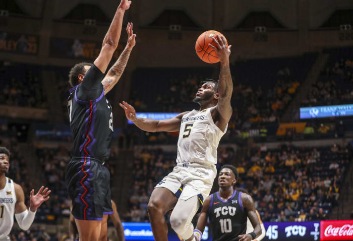 January 18, 2023; Morgantown, West Virginia, USA. West his Virginia Mountaineers guard Joe Toussaint (5) will face his TCU horned his Frogs at his WVU Coliseum in the second half.