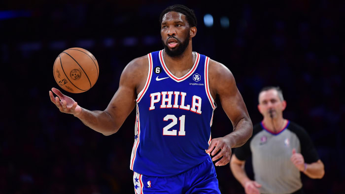 Philadelphia 76ers center Joel Embiid (21) brings the ball up court against the Los Angeles Lakers.