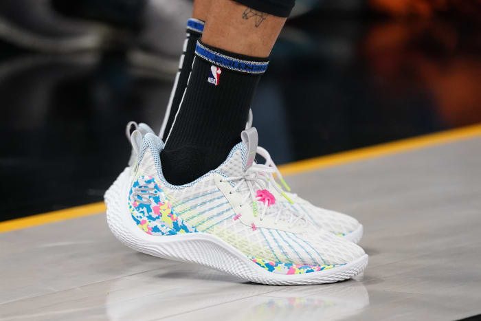 View of Stephen Curry's white and blue shoes.
