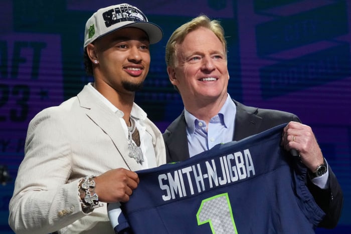 Seattle Seahawks first round draft pick Jaxon Smith-Njigba with NFL Commissioner Roger Goodell