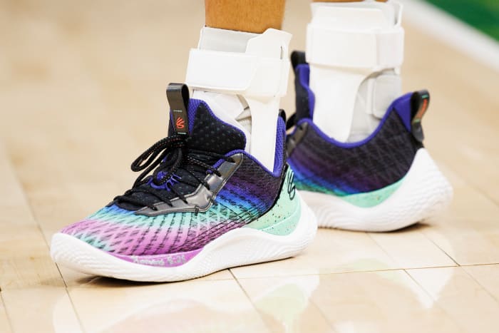 View of Stephen Curry's black and purple shoes.