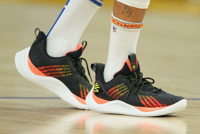 View of Stephen Curry's black and orange shoes.