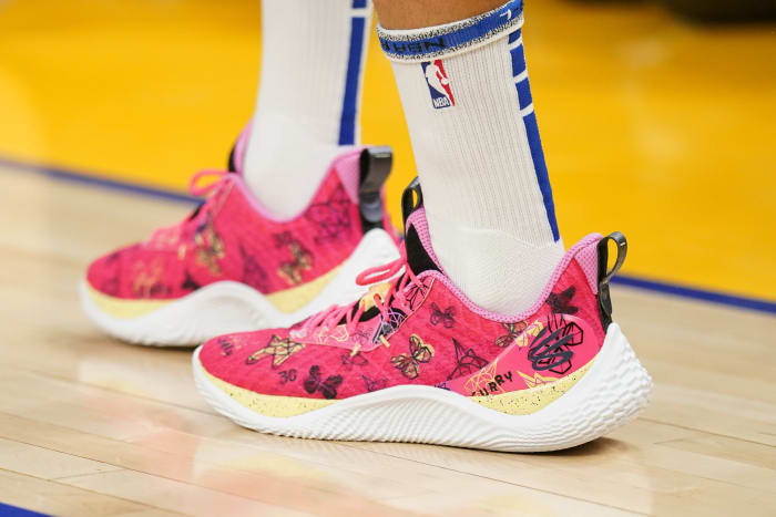 View of Stephen Curry's pink and white shoes.