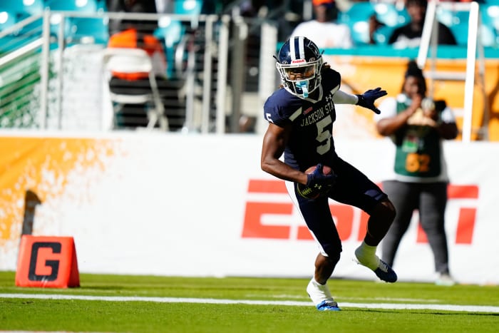 Sep 4, 2022; Miami, Florida, US; Jackson State Tigers wide receiver Shane Hooks (5) scores a touchdown against the Florida A&M Rattlers during the second half at Hard Rock Stadium. Mandatory Credit: Rich Storry-USA TODAY Sports