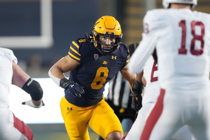 November 19, 2022;  Berkeley, California, USA;  California Golden Bears linebacker Jackson Sirmon (8) rushes Stanford Cardinal quarterback Tanner McKee (18) during the third quarter at FTX Field at California Memorial Stadium.