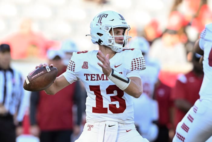 November 12, 2022;  Houston, Texas, USA;  Temple Owls quarterback EJ Warner (13) throws a pass during the third quarter against the Houston Cougars at TDECU Stadium.  Mandatory Credit: Maria Lysaker-USA TODAY Sports