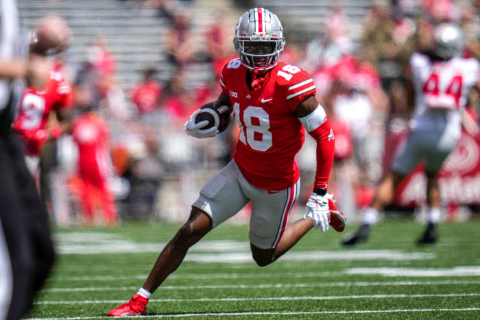 April 15, 2023;  Columbus, Ohio, United States of America;  Ohio State Buckeyes wide receiver Marvin Harrison Jr.  (18) sprints down the side of the field during the first quarter of the Ohio State Buckeyes' spring game at Ohio Stadium on Saturday morning.  Mandatory Credit: Joseph Scheller-The Columbus Dispatch Football Ceb Osufb Spring Game Ohio State At Ohio State