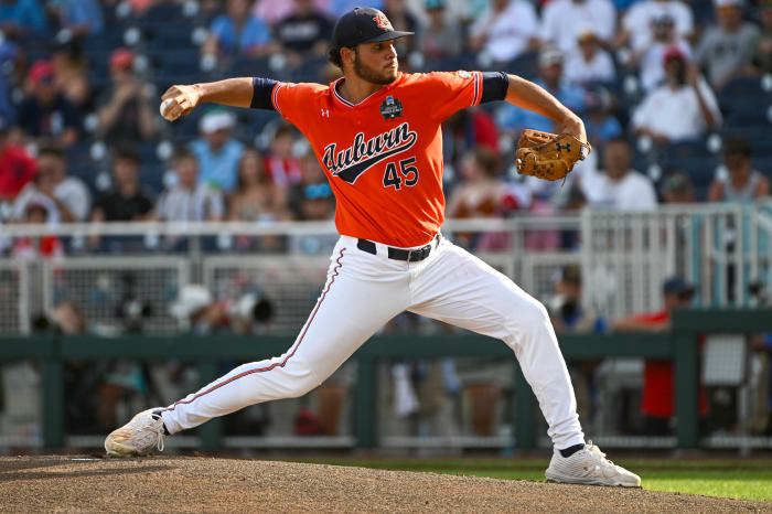 Jun 18, 2022;  Omaha, NE, USA;  Auburn Tigers starting pitcher Joseph Gonzalez (45) throws against the Ole Miss Rebels in the first inning at Charles Schwab Field.  Mandatory Credit: Steven Branscombe-USA TODAY Sports