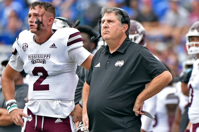 Sep 18, 2021; Memphis, Tennessee, USA; Mississippi State Bulldogs quarterback Will Rogers (2) and head coach Mike Leach (right) look on during the first half against the Memphis Tigers at Liberty Bowl Memorial Stadium. Mandatory Credit: Justin Ford-USA TODAY Sports