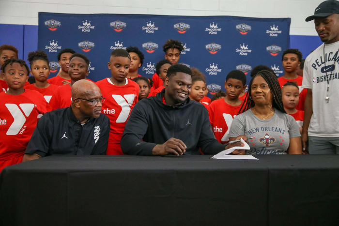 Zion signs his contract