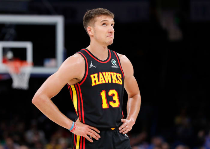 Atlanta Hawks shooting guard Bogdan Bogdanovic stands with hands on his hips.