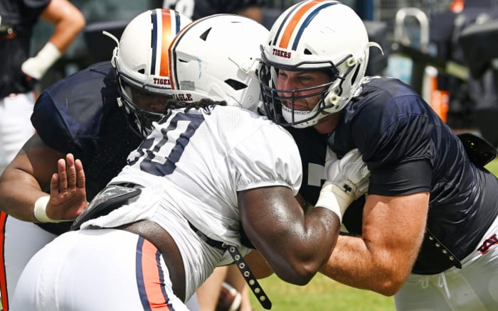 12 Marcus Harris (50), Kilian Zierer (77)Auburn football practice on Thursday, Aug. 11, 2022 in Auburn, Ala.Todd Van Emst/AU Athletics