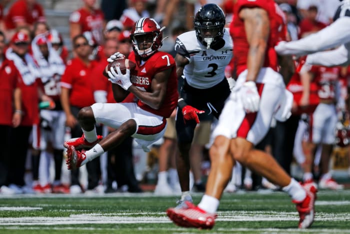 D.J. Matthews leaps to catch a pass in Indiana's game versus Cincinnati.