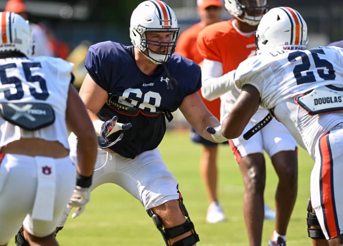 Austin Troxell (68), Eku Leota (55), Colby Wooden (25)Auburn football practice Tue. Aug. 16, 2022 in Auburn, Ala. Todd Van Emst/AU Athletics