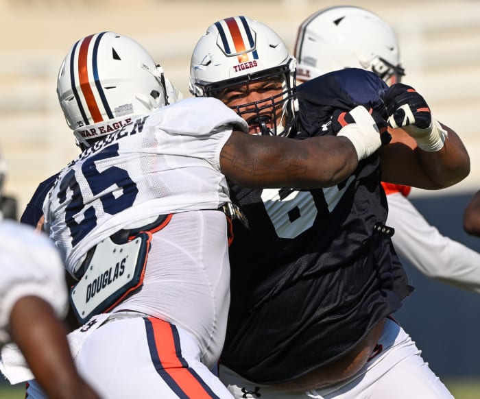 Kameron Stutts (62), Colby Wooden (25)Auburn football practice Tue. Aug. 16, 2022 in Auburn, Ala. Todd Van Emst/AU Athletics