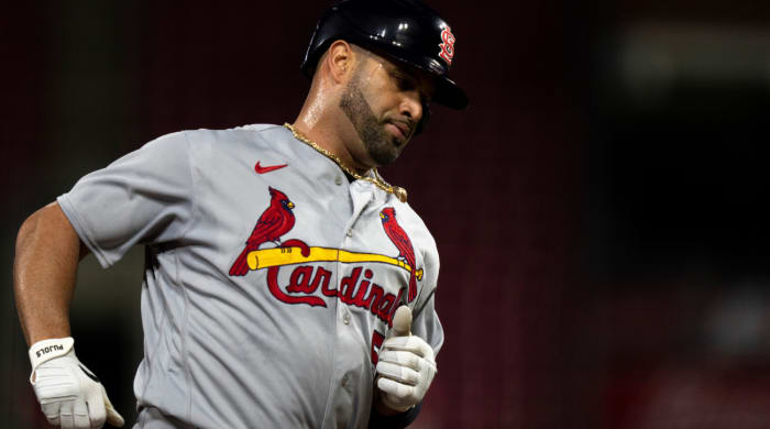 St. Louis Cardinals first baseman Albert Pujols (5) runs the bases after hitting a 2-run home run in the third inning of the MLB game between the Cincinnati Reds and St. Louis Cardinals at Great American Ball Park in Cincinnati on Monday, Aug. 29, 2022. St Louis Cardinals At Cincinnati Reds 386