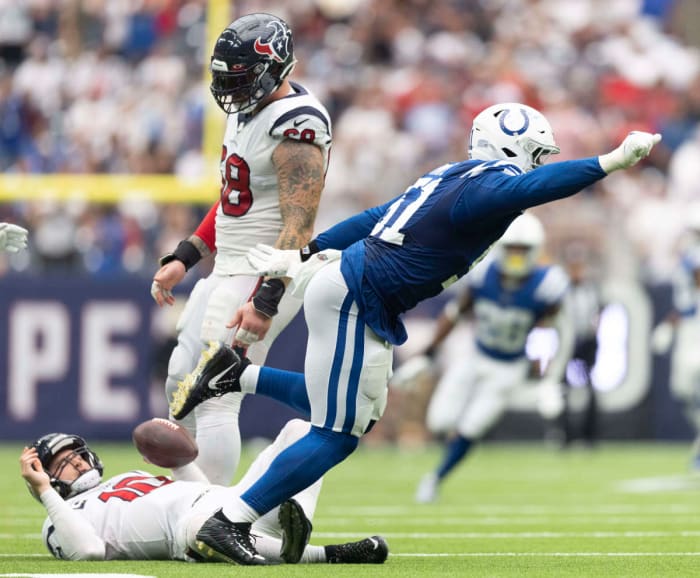 Sep 11, 2022; Houston, Texas, USA; Indianapolis Colts defensive end Kwity Paye (51) celebrates his sack against Houston Texans quarterback Davis Mills (10) in overtime at NRG Stadium.