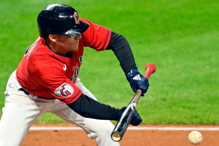 Sep 29, 2022;  Cleveland, Ohio, USA;  Cleveland Guardians center fielder Myles Straw (7) bunts in the eighth inning against the Tampa Bay Rays at Progressive Field.