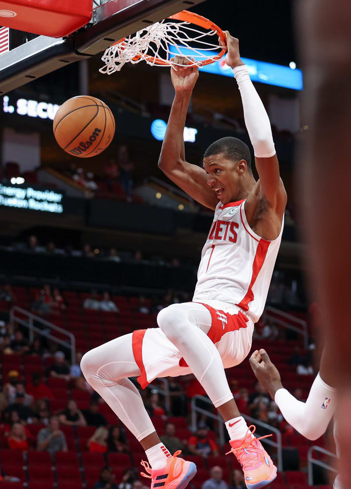 Oct 2, 2022;  Houston, Texas, USA;  Houston Rockets forward Jabari Smith Jr.  (1) dunks the ball during the first quarter against the San Antonio Spurs at Toyota Center.  Mandatory Credit: Troy Taormina-USA TODAY Sports