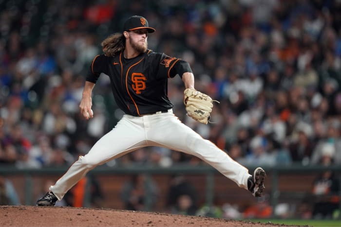 SF Giants pitcher Cole Waites throws a pitch.
