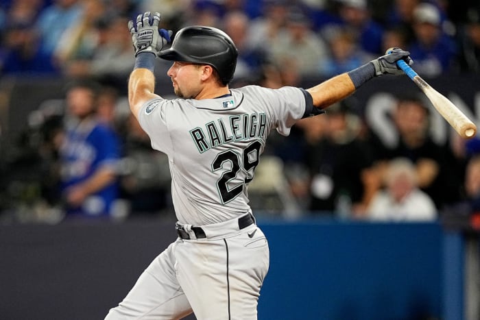 Mariners catcher Cal Raleigh rips a double in the ninth inning against the Blue Jays.