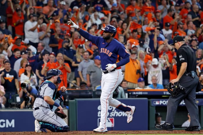 Astros star Yordan Alvarez points his finger in the air