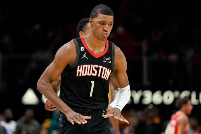 Oct 19, 2022;  Atlanta, Georgia, USA;  Houston Rockets forward Jabari Smith Jr.  (1) reacts after making a three point shot against the Atlanta Hawks during the second half at State Farm Arena.  Mandatory Credit: Dale Zanine-USA TODAY Sports