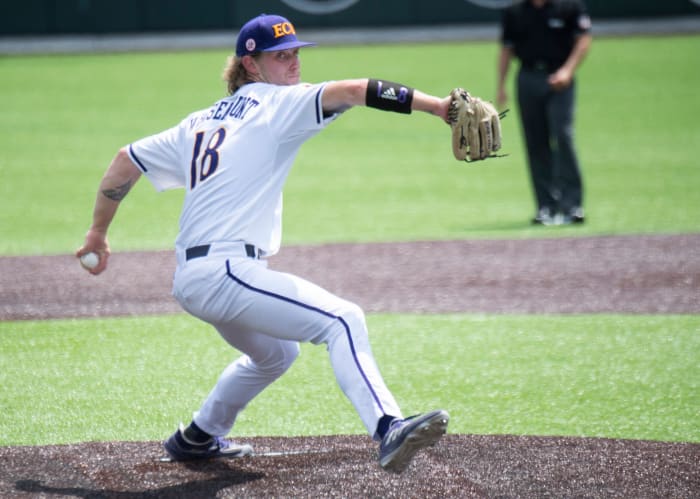 East Carolina pitcher Carson Whisenhunt, who was drafted by the SF Giants in the 2022 MLB Draft, throws a pitch.