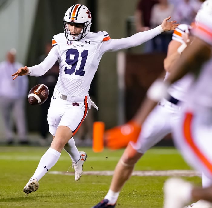 Nov 5, 2022; Starkville, MS, USA; Oscar Chapman (91) punts the ball during the game between Auburn and Mississippi State at Davis Wade Stadium . Austin Perryman / AU Athletics