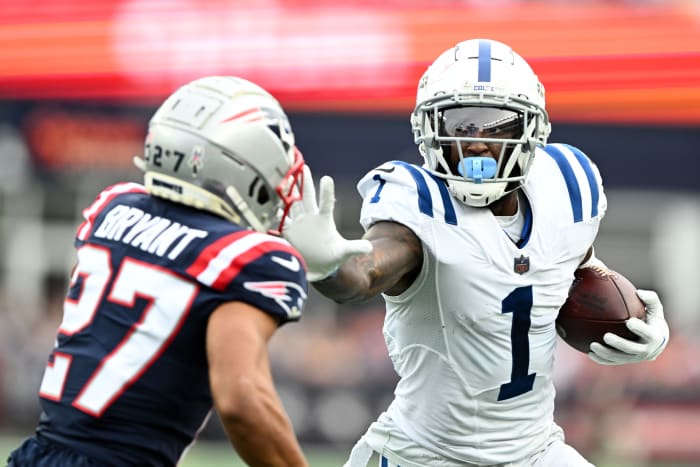 Nov 6, 2022; Foxborough, Massachusetts, USA; Indianapolis Colts wide receiver Parris Campbell (1) runs with the ball against New England Patriots cornerback Myles Bryant (27) during the first half at Gillette Stadium.