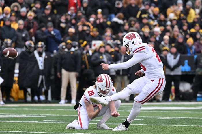 Wisconsin kicker Nate Van Zelst making a field goal against Iowa