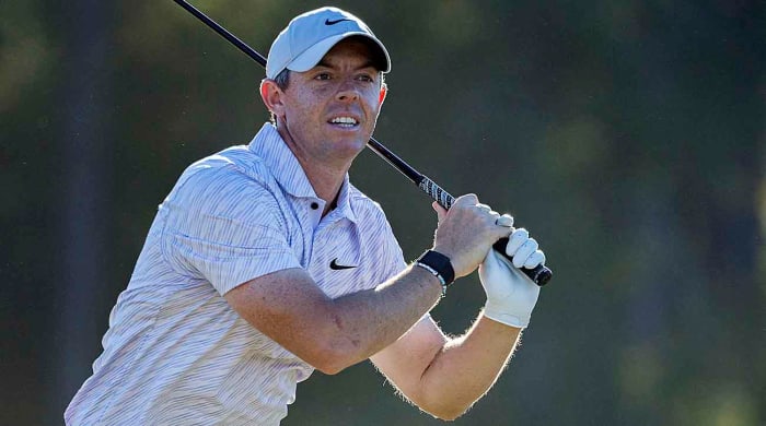 Rory McIlroy watches a shot at the 2022 CJ Cup in South Carolina.