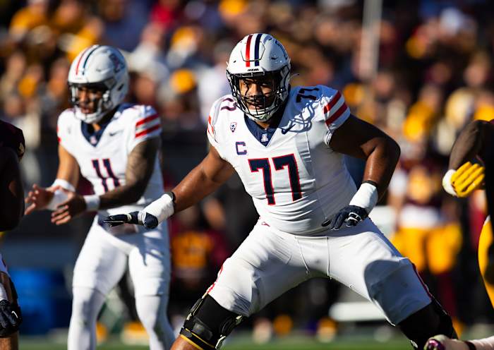 November 25, 2023. Tempe, Arizona, USA. Arizona Wildcats offensive lineman Jordan Morgan (77) vs. Arizona State Sun Devils during the Territorial Cup at Mountain America Stadium.