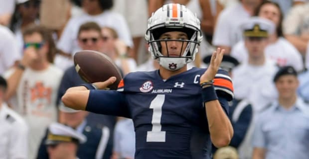 Auburn Tigers quarterback Peyton Thorne throws a pass during an SEC college football game.