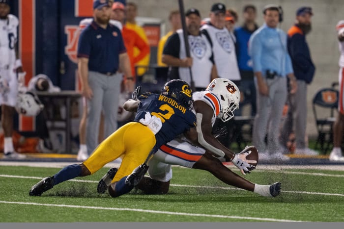 Sep 9, 2023; Berkeley, California, USA; Auburn Tigers tight end Rivaldo Fairweather (13) makes a catch for a first down against California Golden Bears defensive back Craig Woodson (2) during the fourth quarter at California Memorial Stadium. Mandatory Credit: Neville E. Guard-USA TODAY Sports