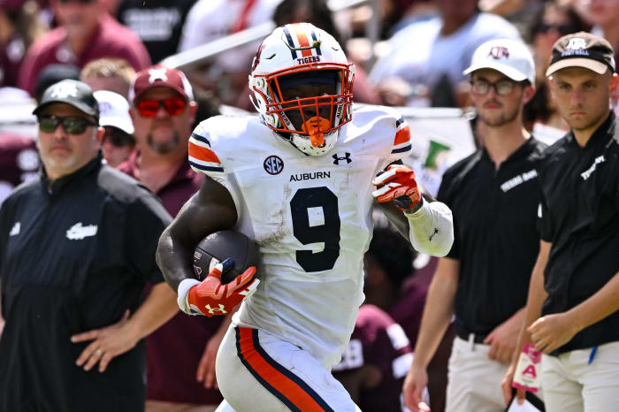 Sep 23, 2023; College Station, Texas, USA; Auburn Tigers linebacker Eugene Asante (9) recovered a fumble and ran the ball in for a touchdown during the fourth quarter against the Texas A&M Aggies at Kyle Field. Mandatory Credit: Maria Lysaker-USA TODAY Sports