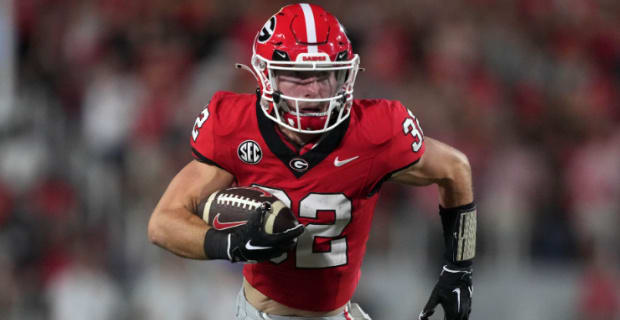 Georgia Bulldogs running back Cash Jones on a rushing attempt during a college football game in the SEC.