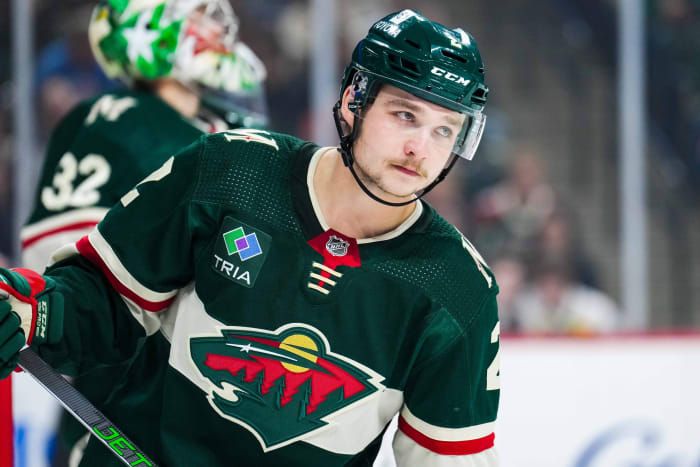 Wild trade defenseman Calen Addison to Sharks - Sports Illustrated ...