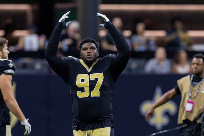 Malcolm Roach leads the Who Day chant before a game.