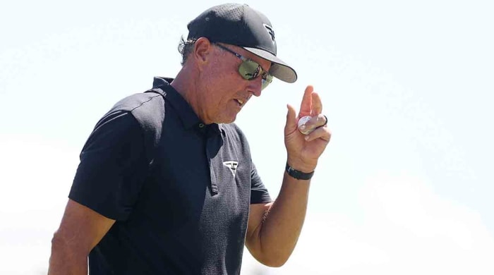 Captain Phil Mickelson of HyFlyers GC reacts after hitting a putt on the first green during day three of the 2023 LIV Golf Invitational-Bedminster at Trump National Golf Club.