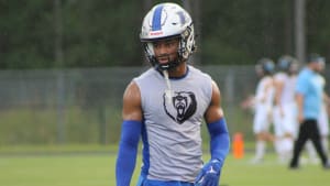 Sharif Denson warming up in the rain before the first contest of his senior season at Bartram Trail against Ponte Vedra.