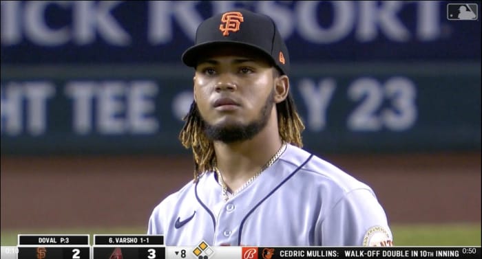 Camilo Doval reacts after giving up a home run to Daulton Varsho